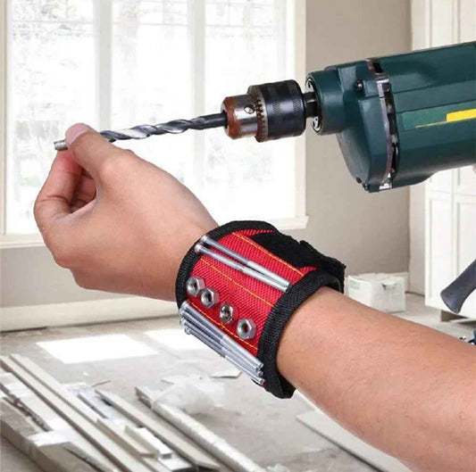 Magnetic wristband on a hand of the technician