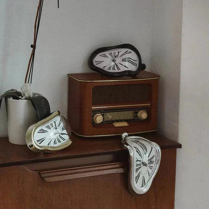 Muliple Dali clock above a desk